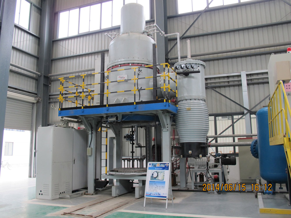 Vertical bottom loading vacuum heat treatment furnace